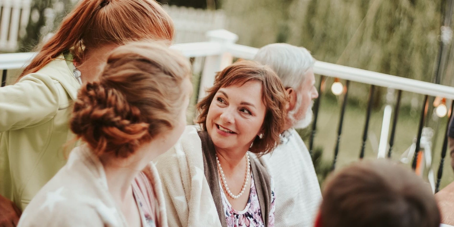 Women living between cultures with female friends and family